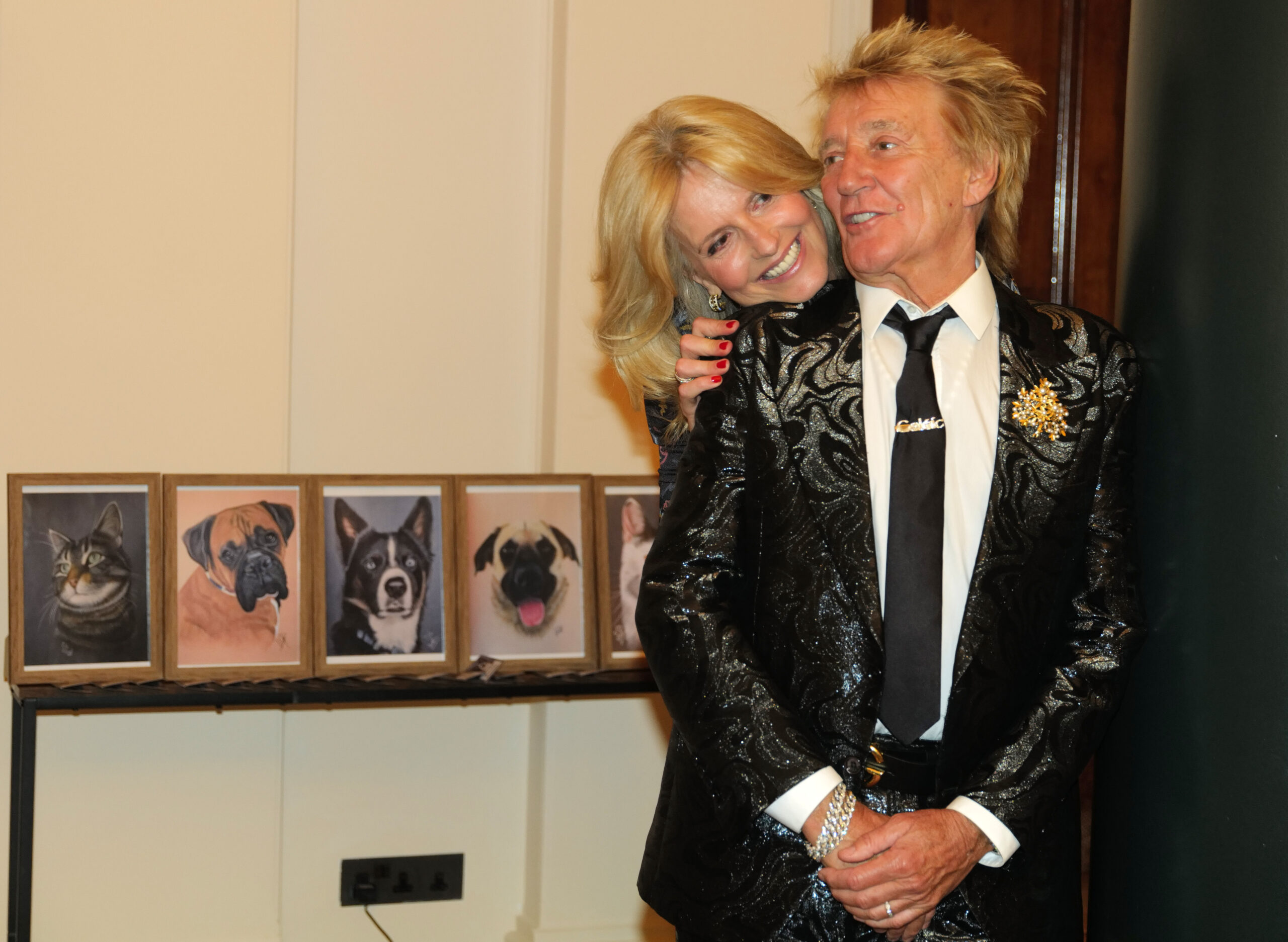 Penny Lancaster and Rod Stewart hugging