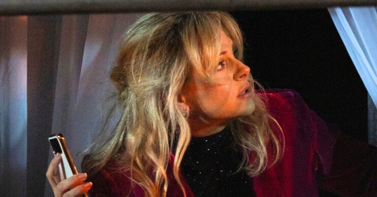 Coronation Street's Sarah looking out of window