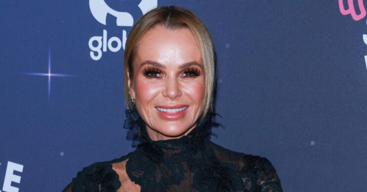 Amanda Holden smiling at event