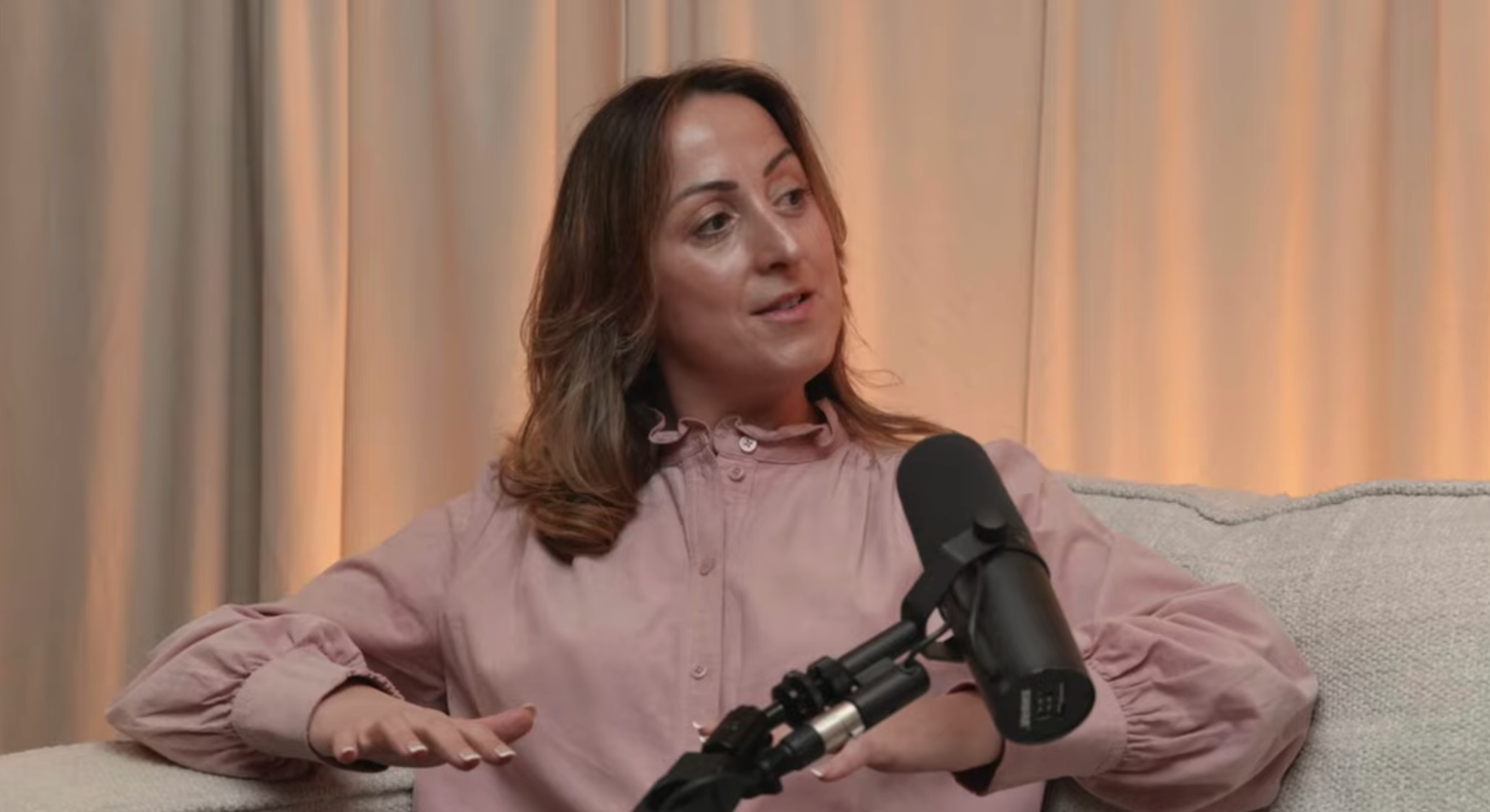 Natalie Cassidy talking on a podcast