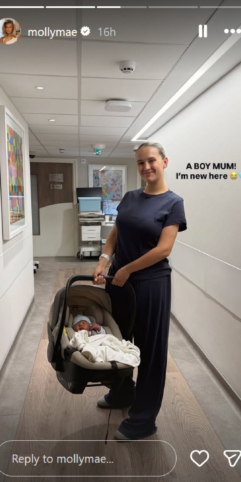 Molly-Mae Hague carrying baby son in car seat 