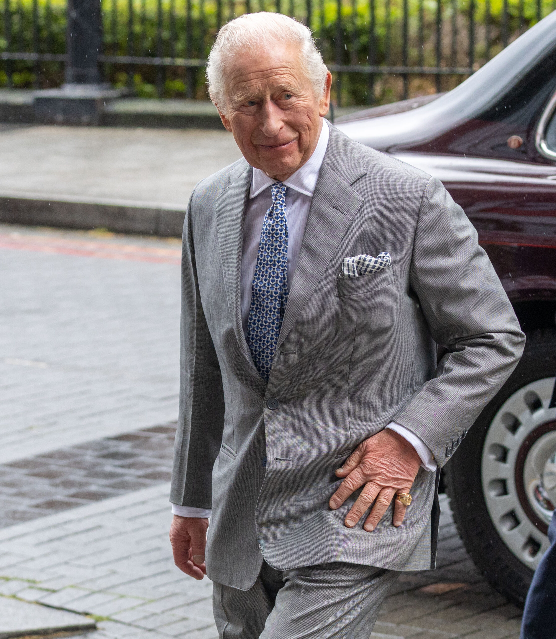 King Charles in grey suit