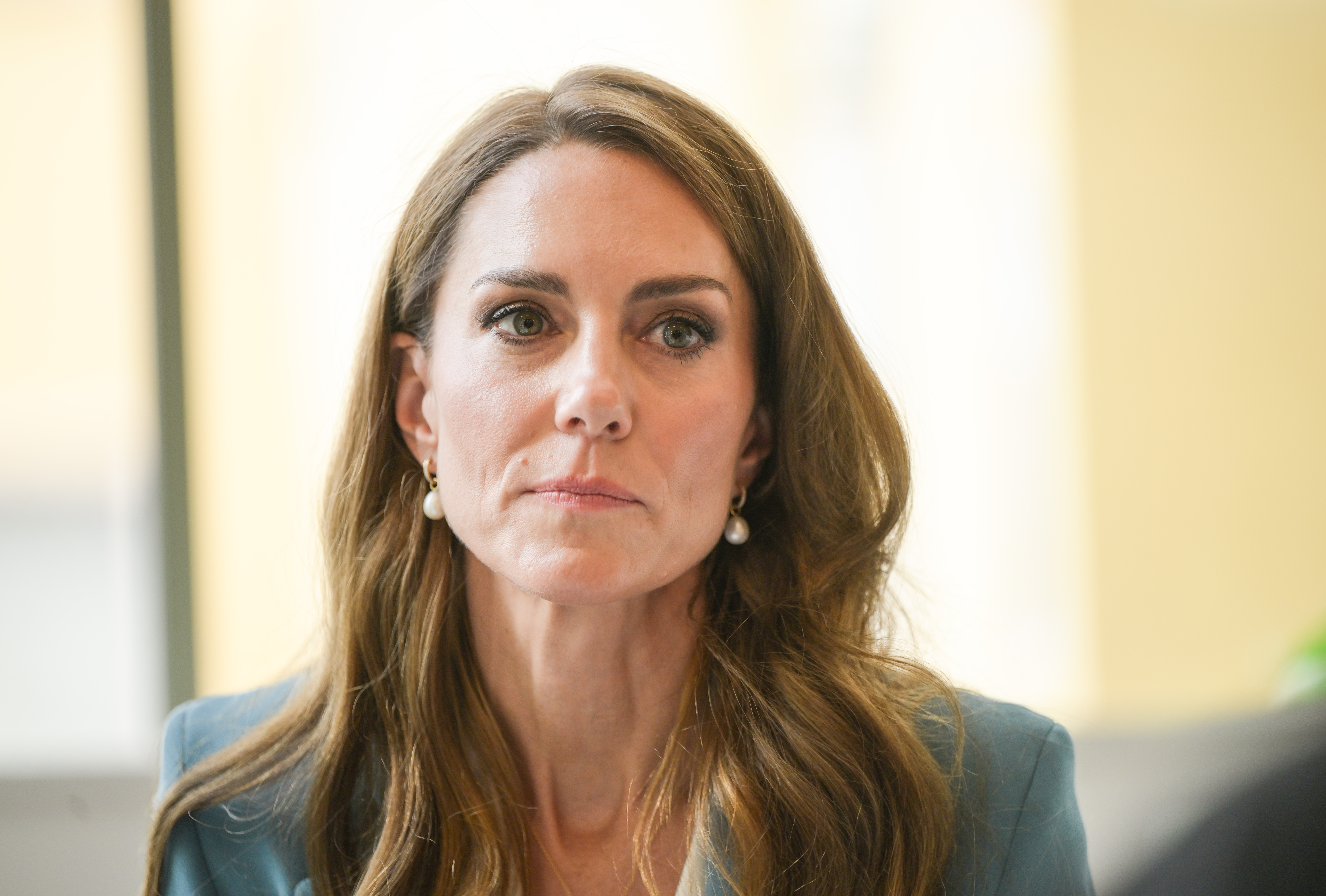 Princess Kate looking serious during royal engagement
