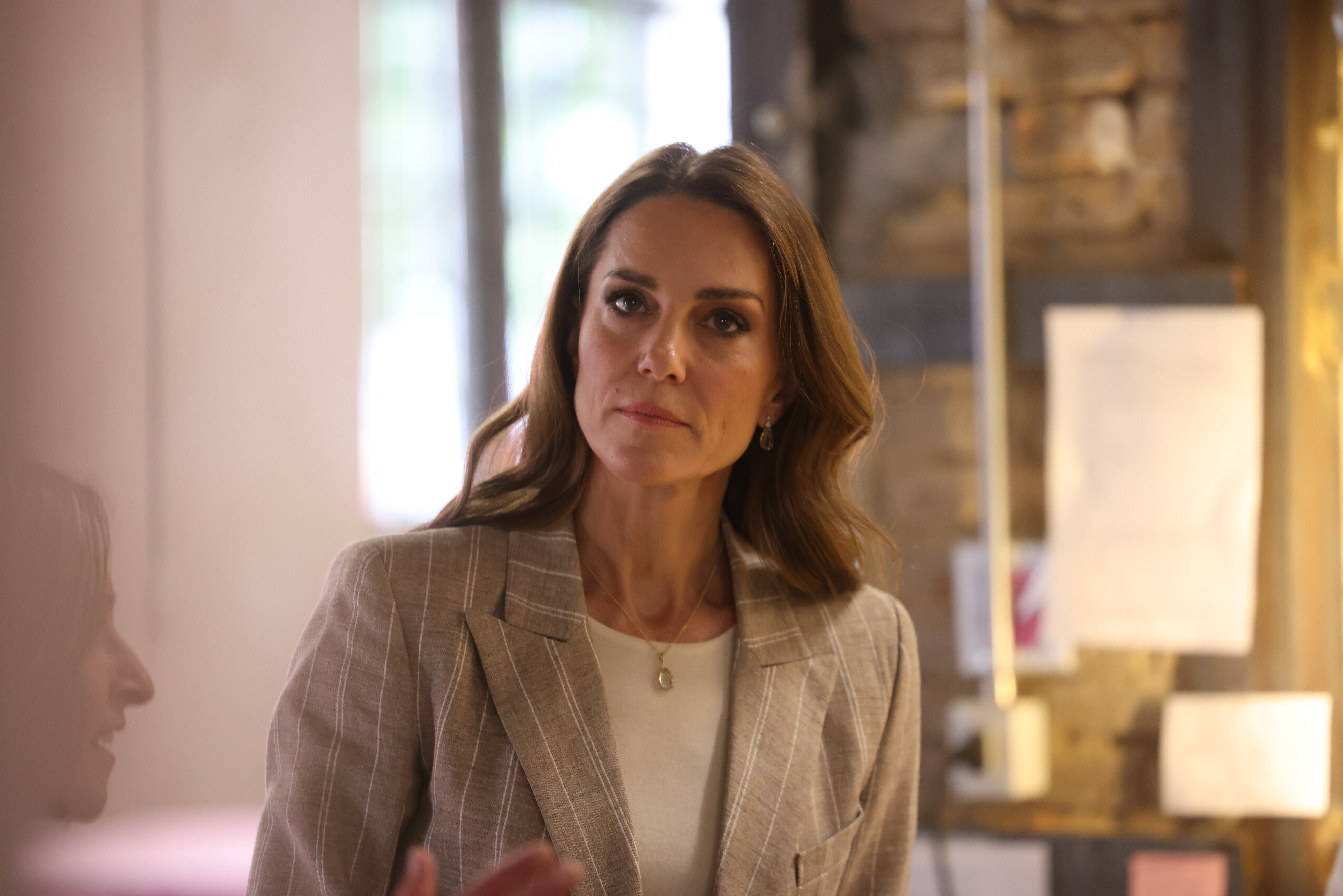 Princess Kate looking serious during royal engagement