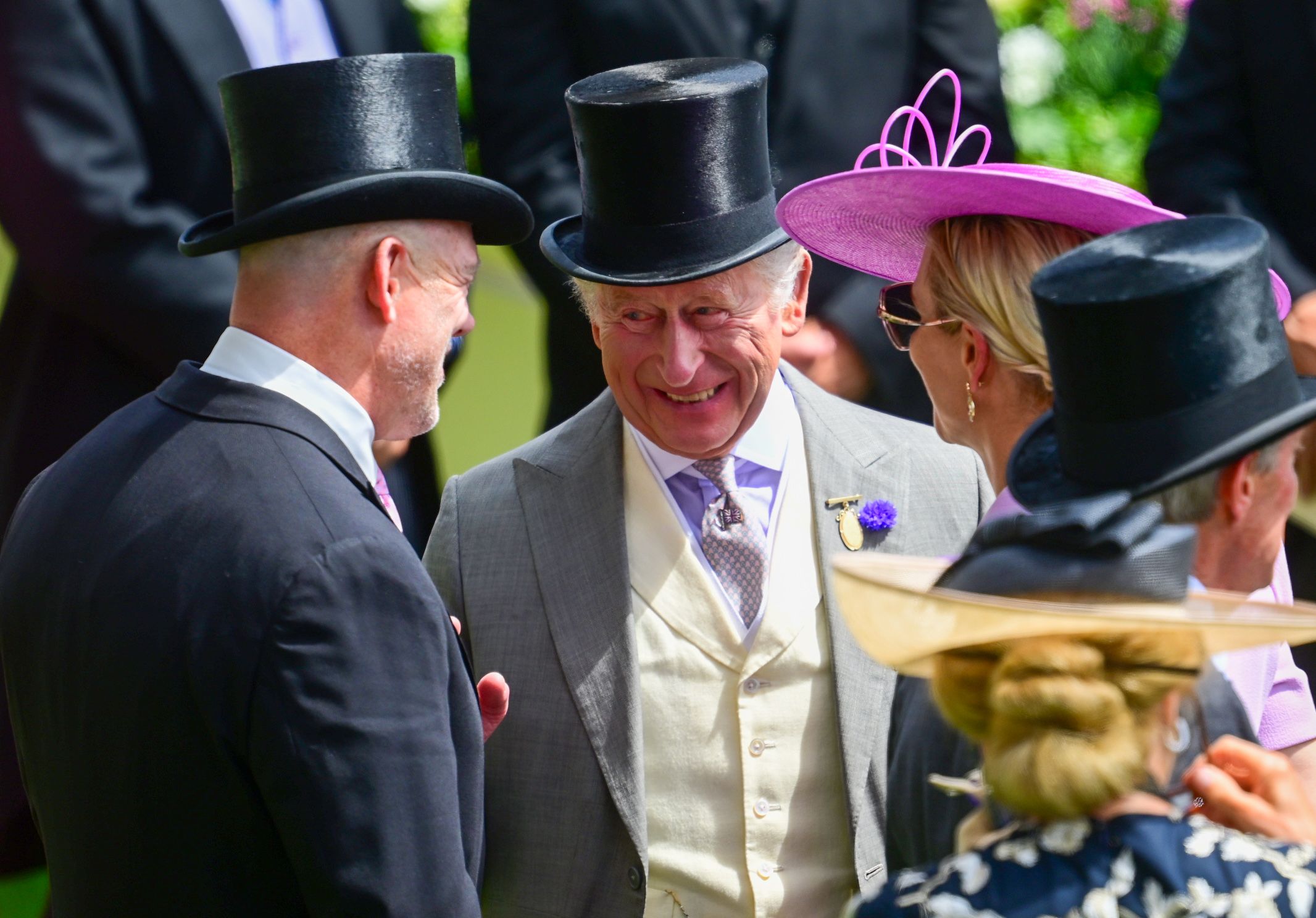 Mike and Zara Tindall speaking to King Charles at Royal Ascot