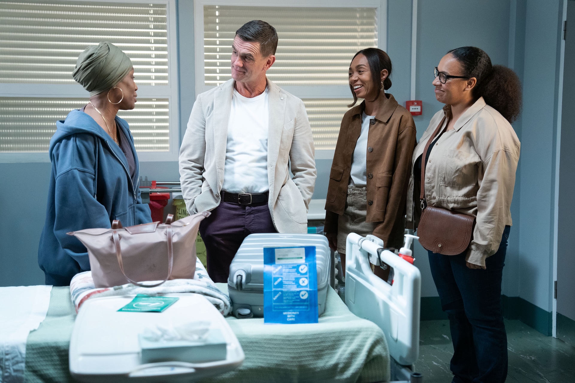 Libby, Jack and Chelsea visiting Denise at the hospital in EastEnders 