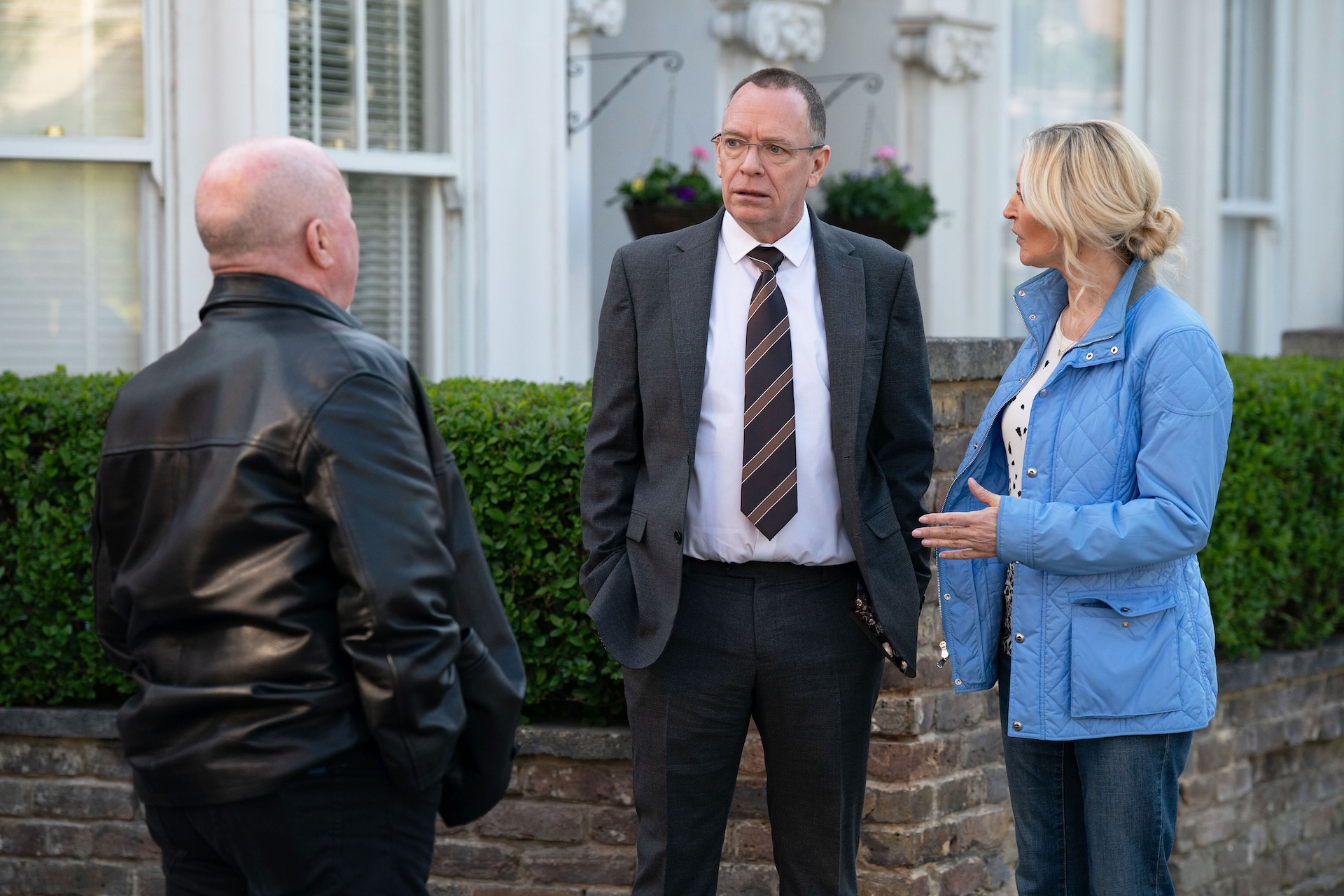 Ian, Phil and Kathy talking in EastEnders