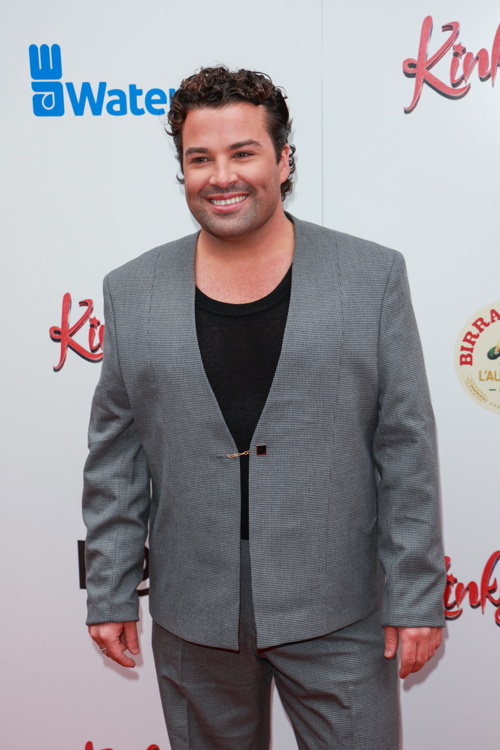 X Factor star Joe McElderry smiling at event