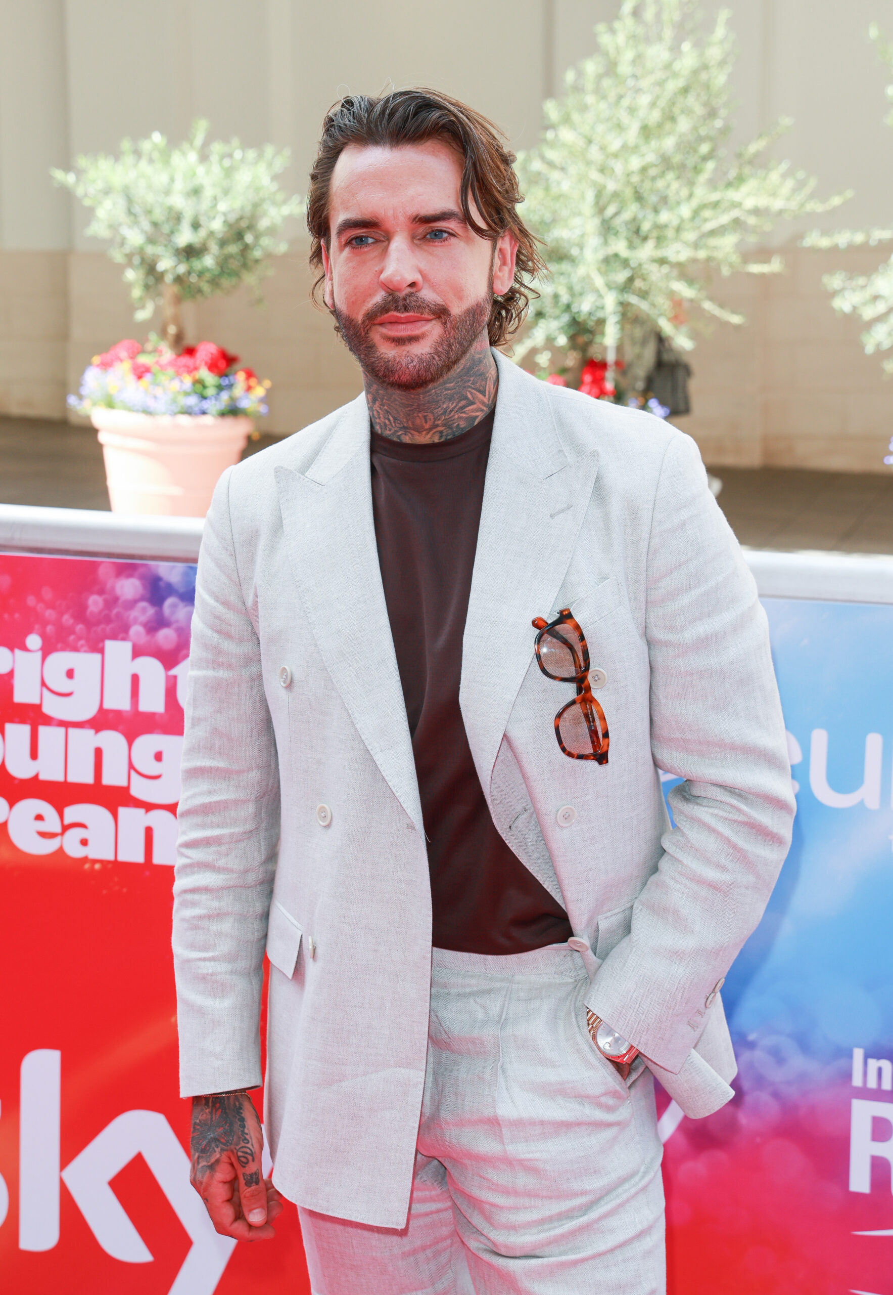 Pete Wicks smiling on the red carpet