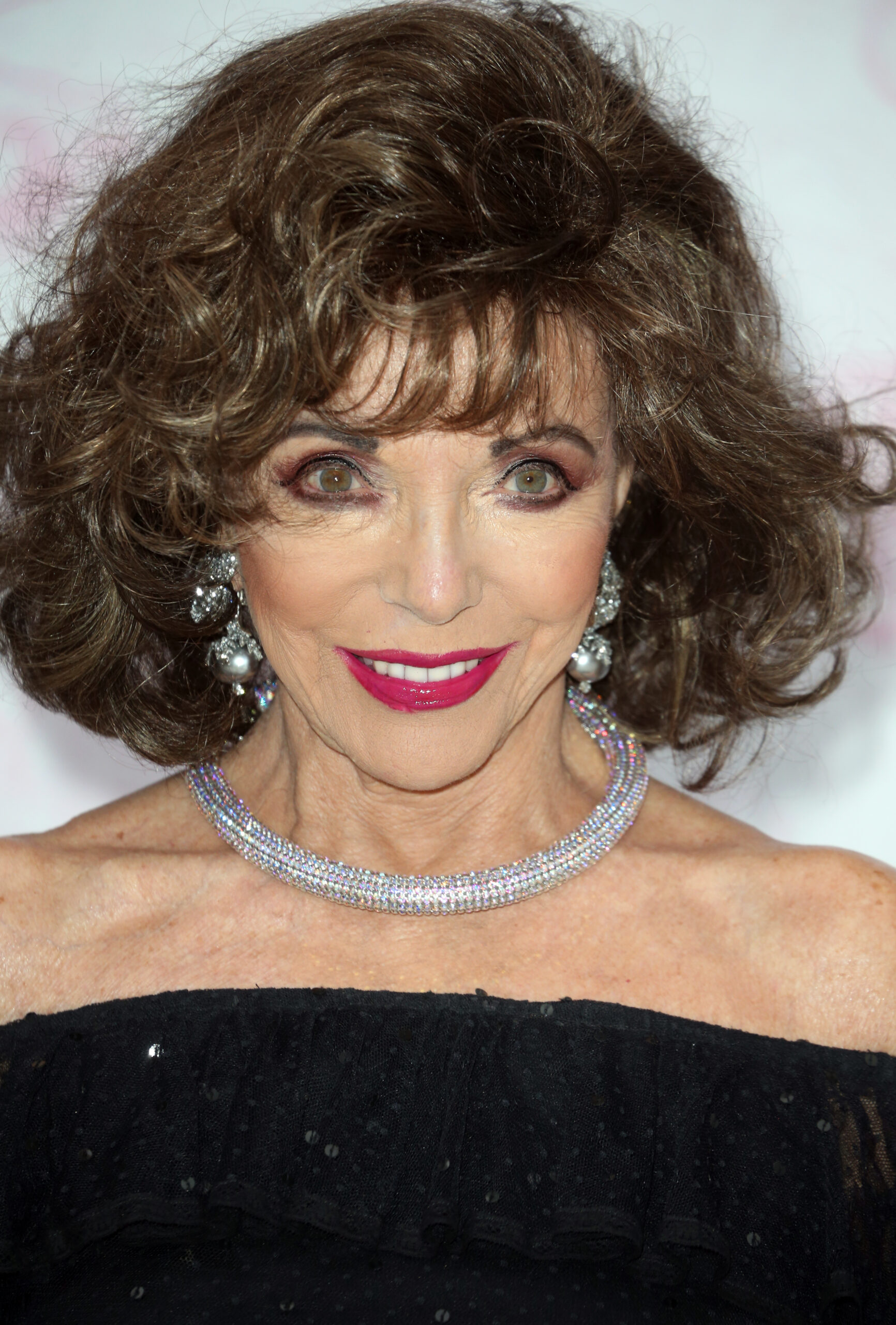 Joan Collins smiling