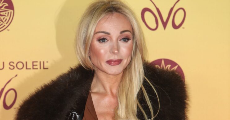 Helen George with a serious expression