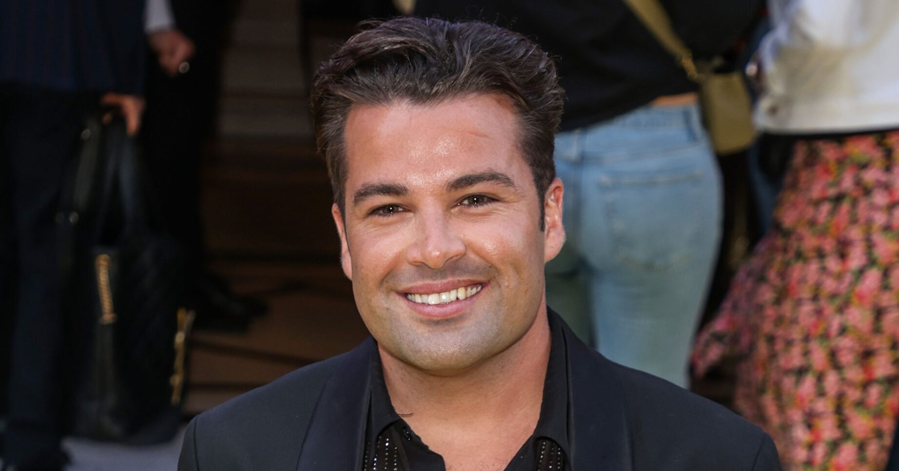X Factor star Joe McElderry smiling at event