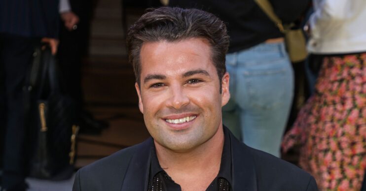 X Factor star Joe McElderry smiling at event