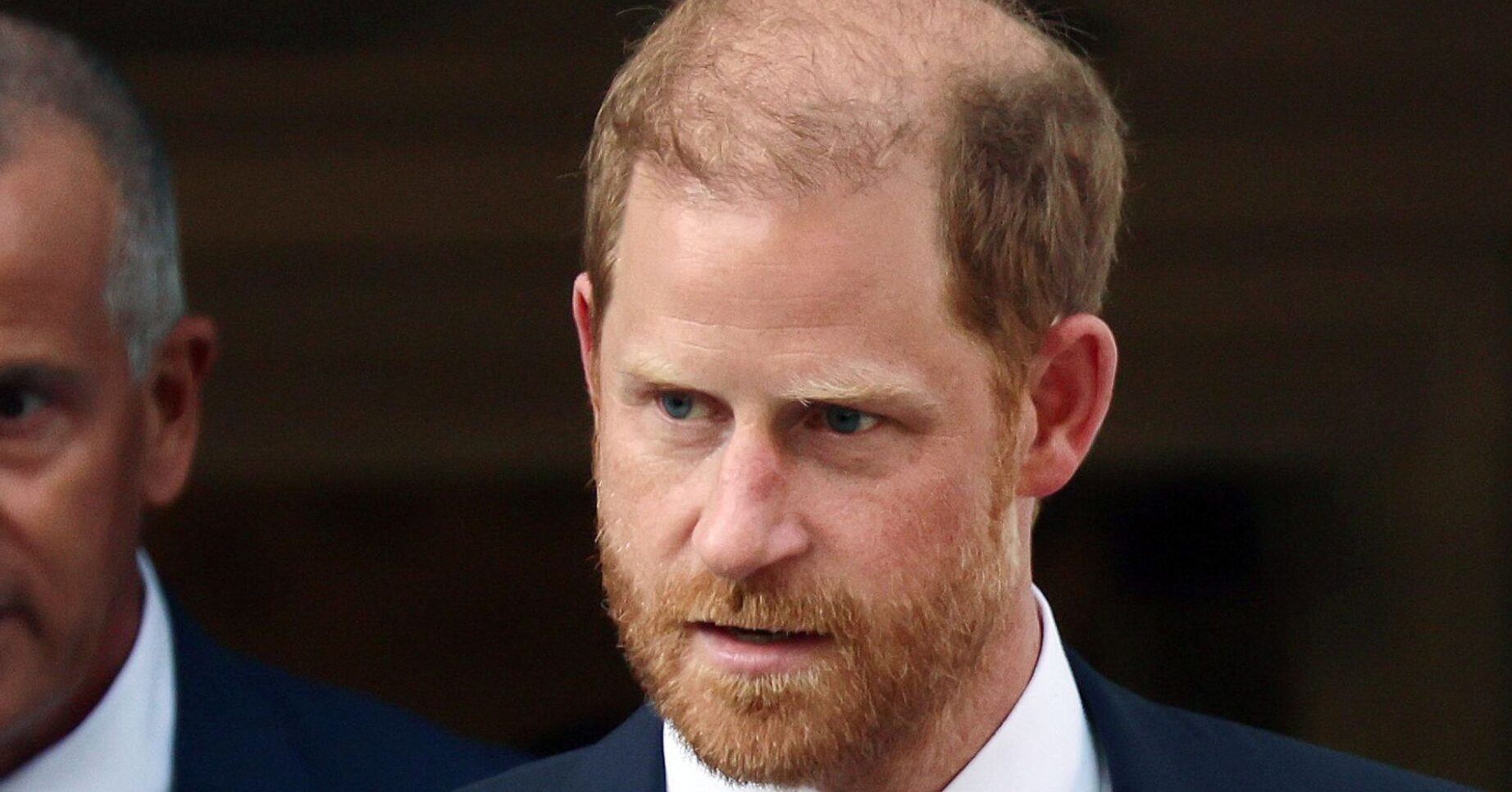 Prince Harry frowning