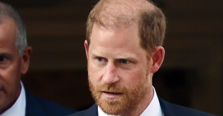 Prince Harry frowning