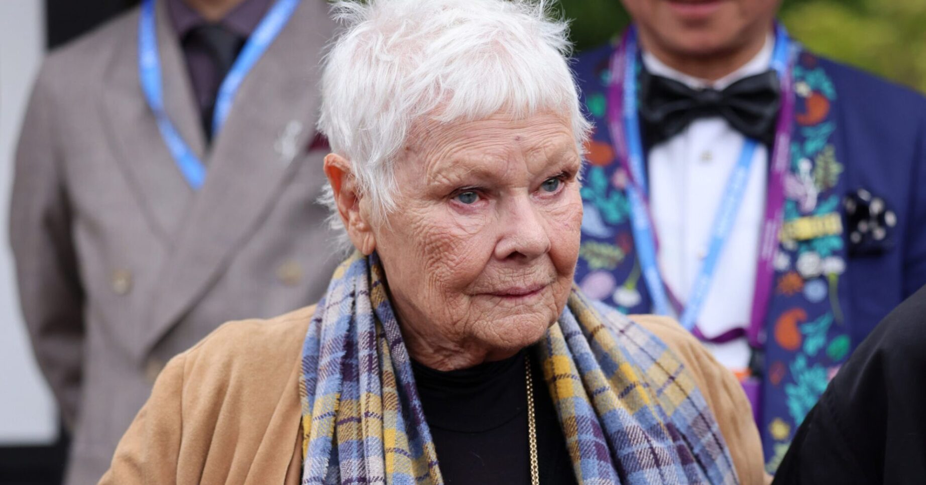 Judi Dench with a serious expression