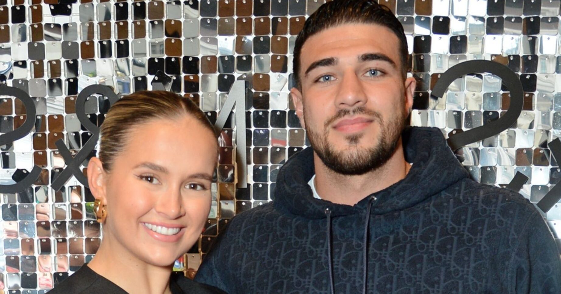 Molly-Mae and Tommy Fury smiling for a photo together