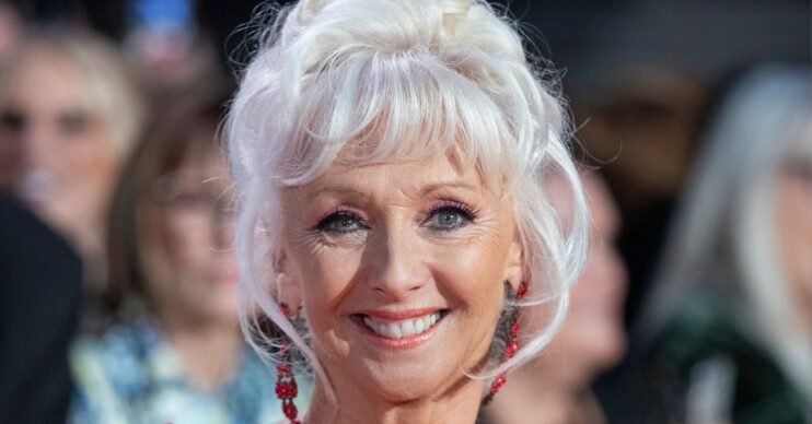 Debbie McGee smiling at event