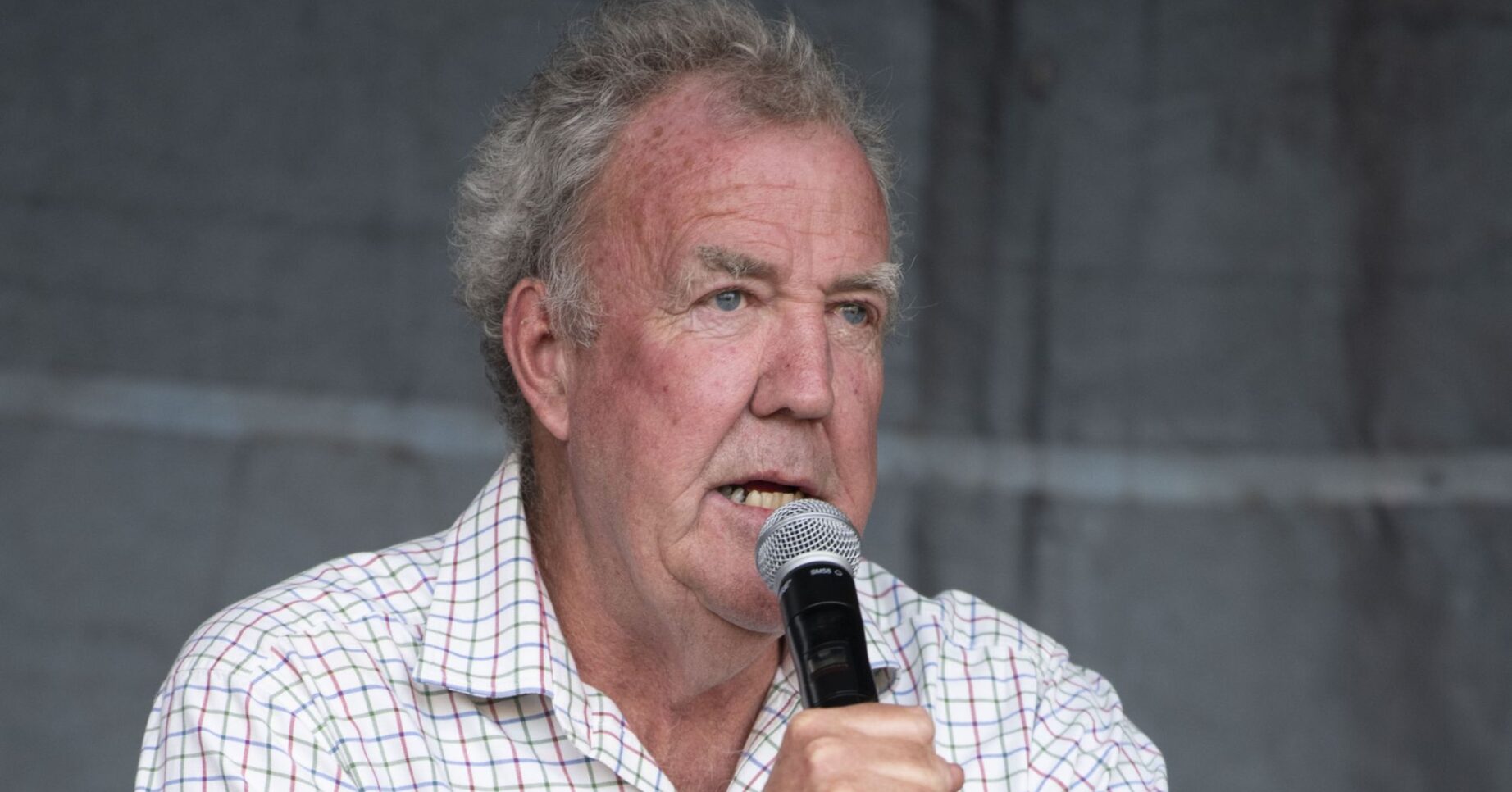 Jeremy Clarkson speaking on a mic