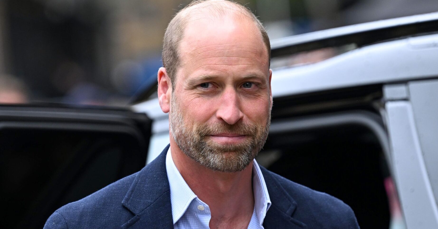Prince William frowning