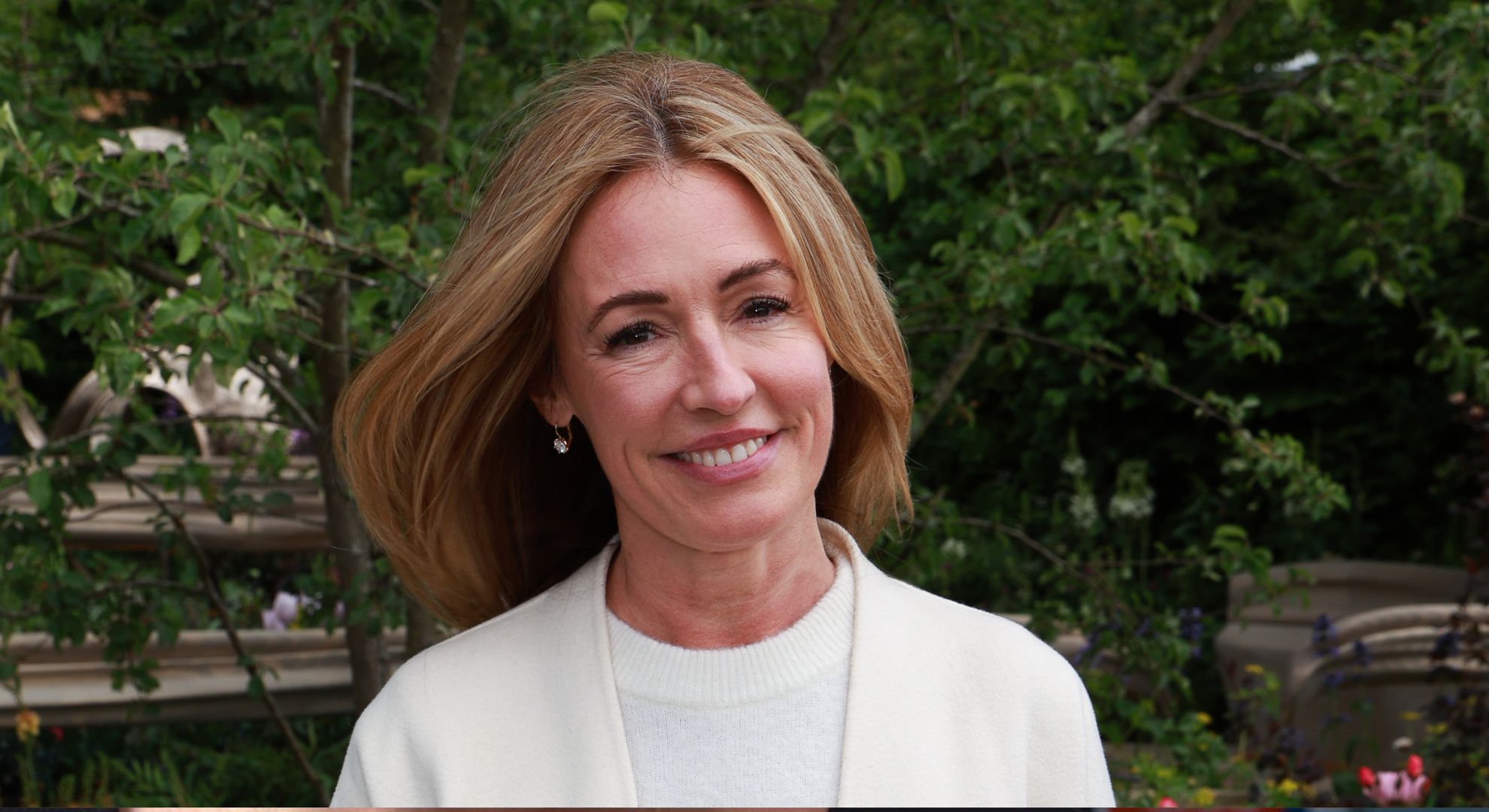 This Morning star Cat Deeley mows lawn in black bikini amid heatwave