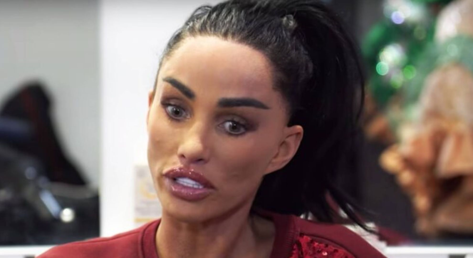 Katie Price looking down