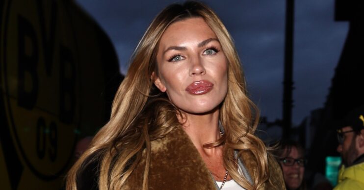 Abbey Clancy looking in front