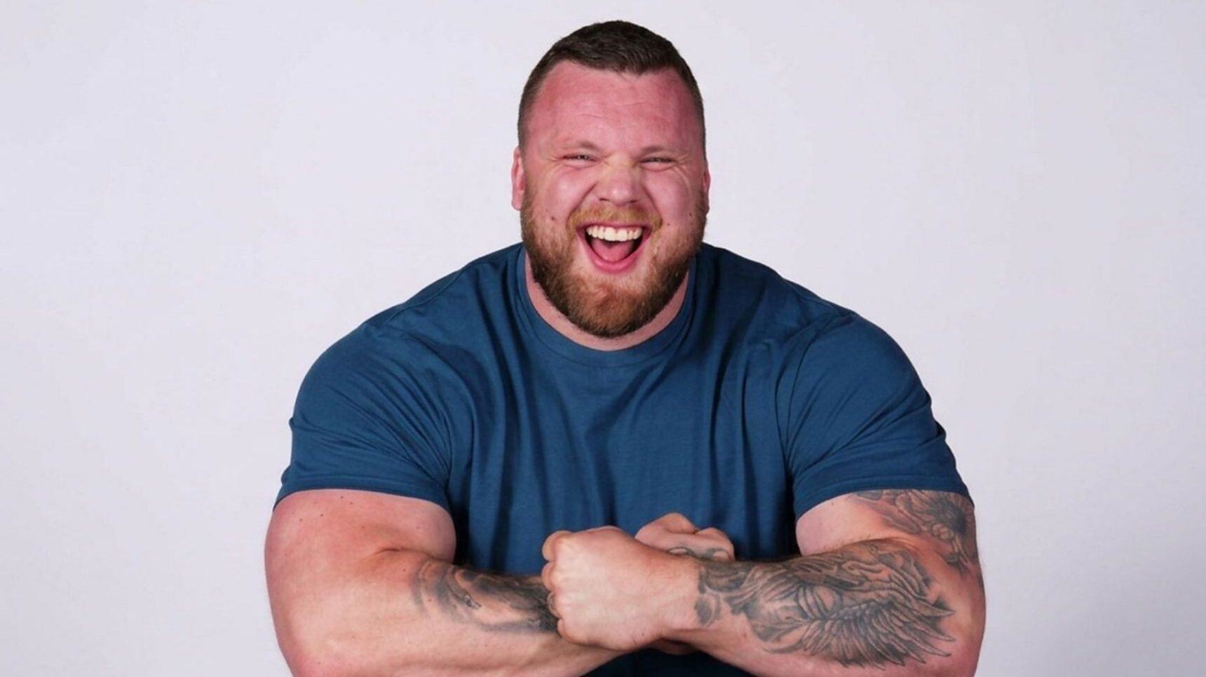 Tom Stoltman blue t shirt