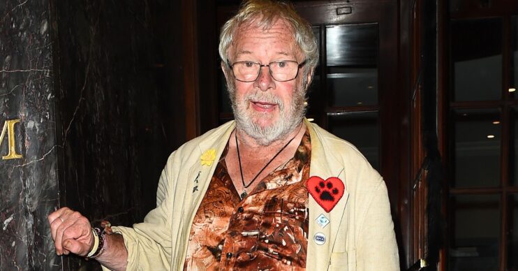 Bill Oddie in brown shirt and yellow jacket