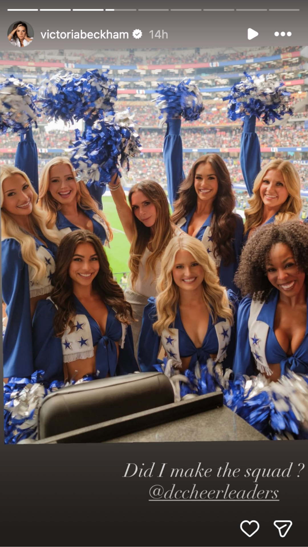 Victoria Beckham posing with the Dallas Cowboys Cheerleaders