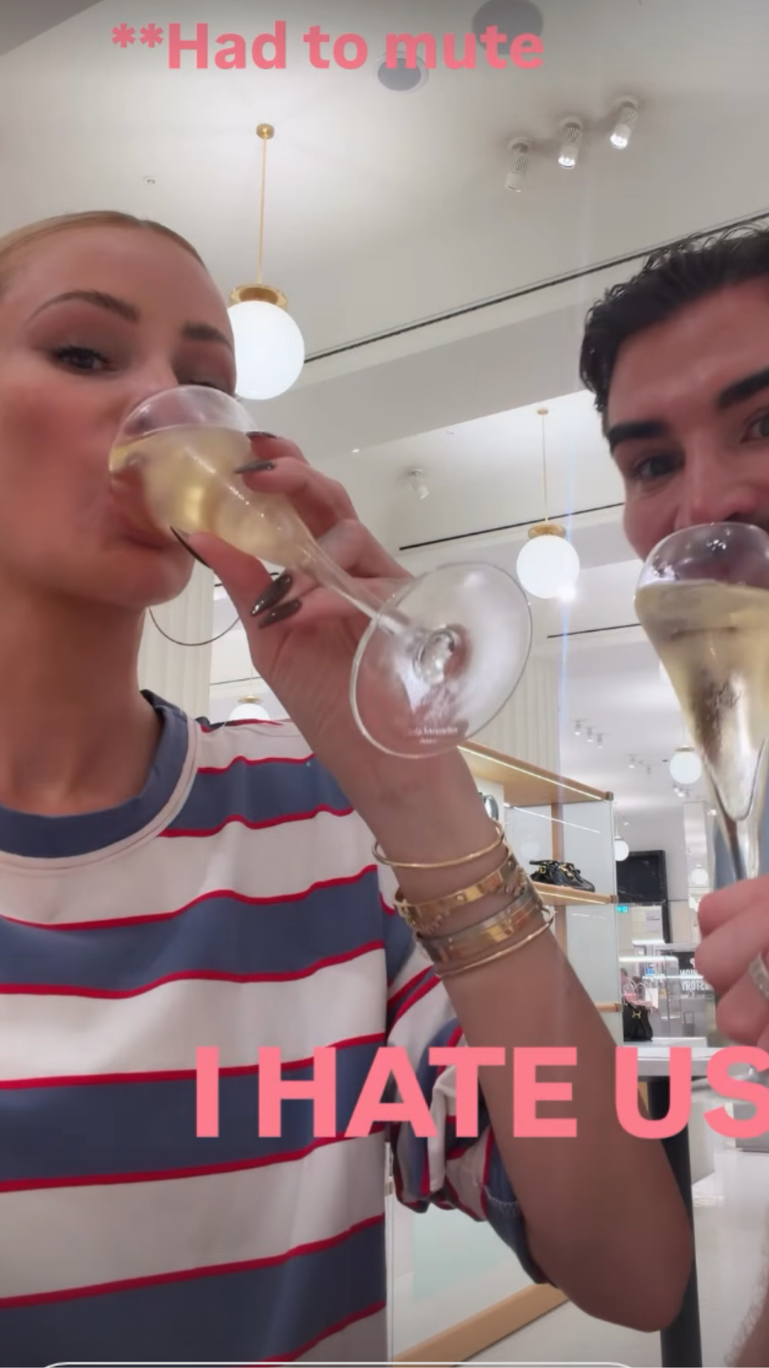 Olivia Attwood with her friend Mark drining champagne