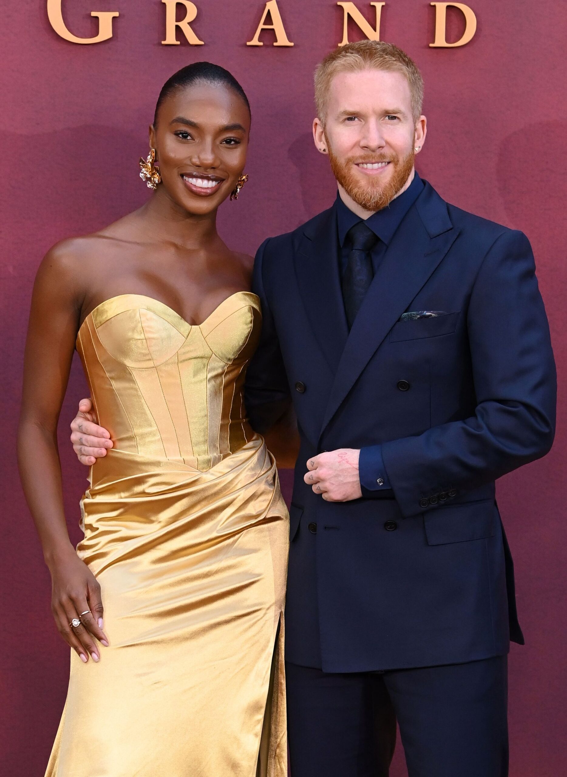Chyna Mills and Neil Jones smiling at event