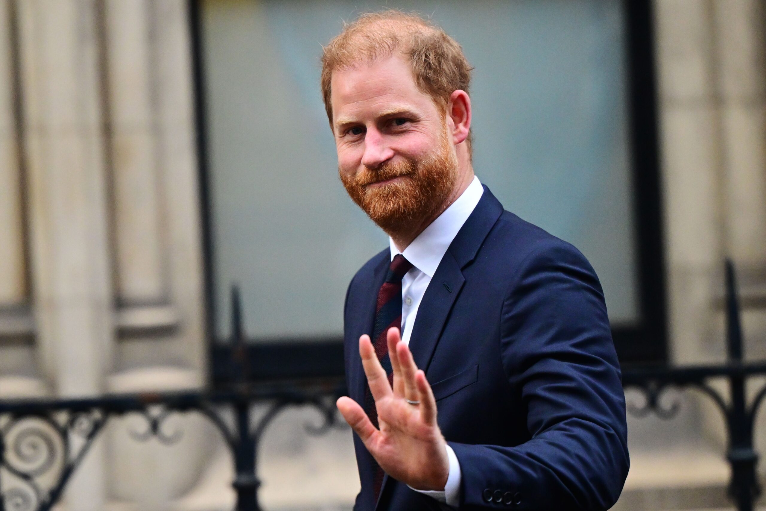 Prince Harry waving during UK visit