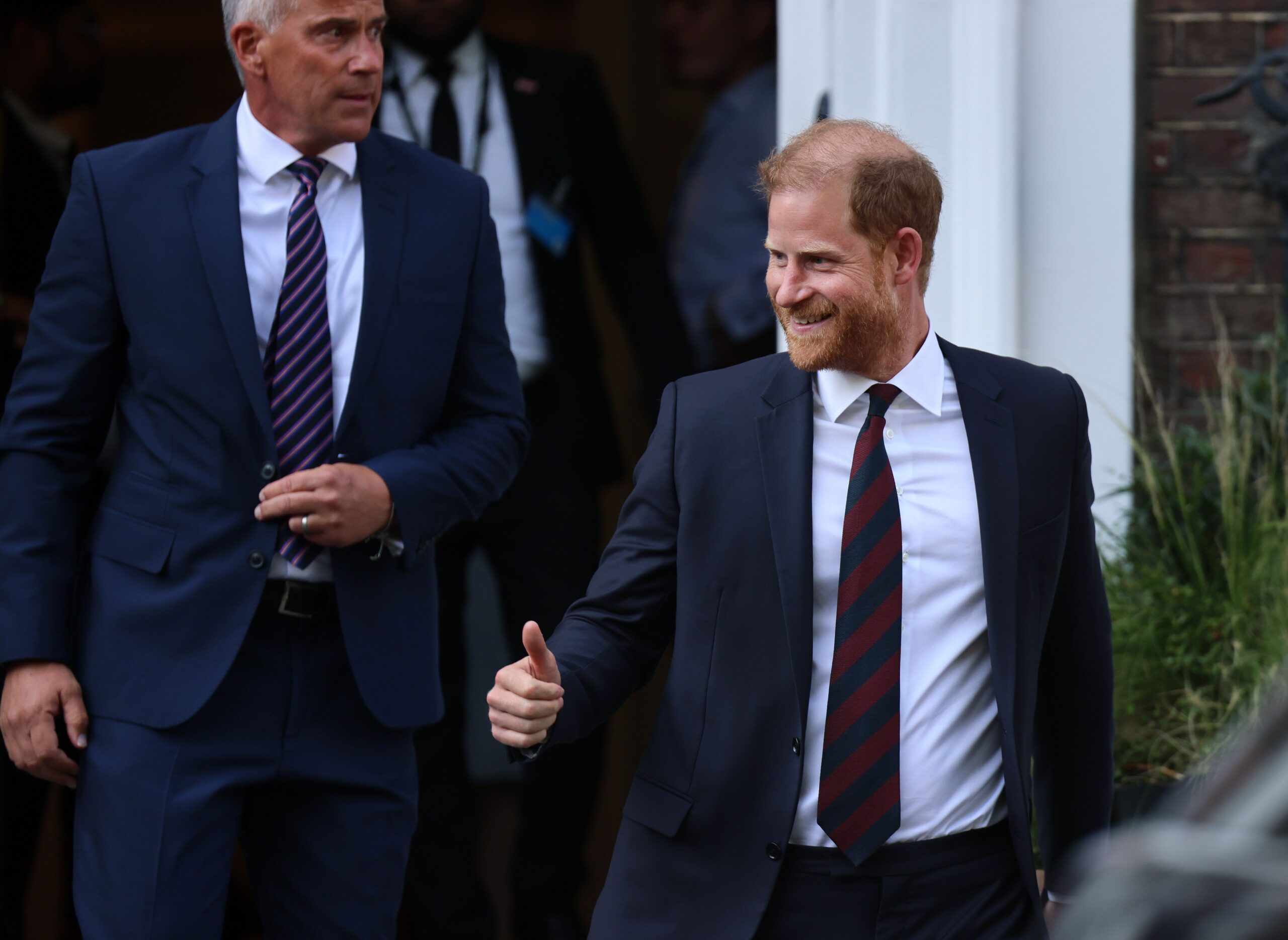 Prince Harry arrives for Invictus Games event in London on July 7, he smiles and gives a thumbs up