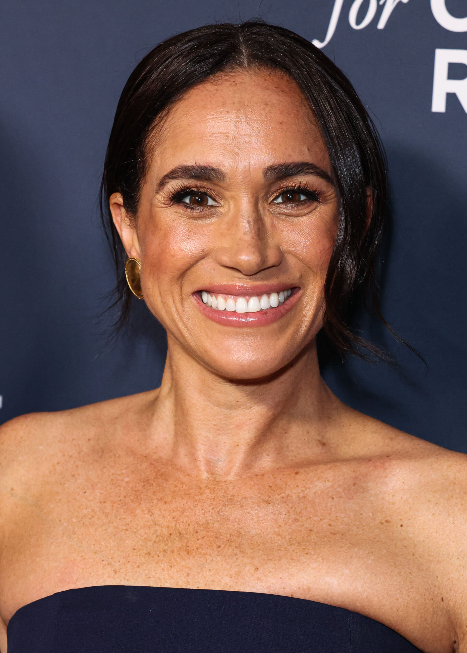 Meghan Markle smiling at the Alliance for Children's Rights 34th Annual Champions For Children Gala