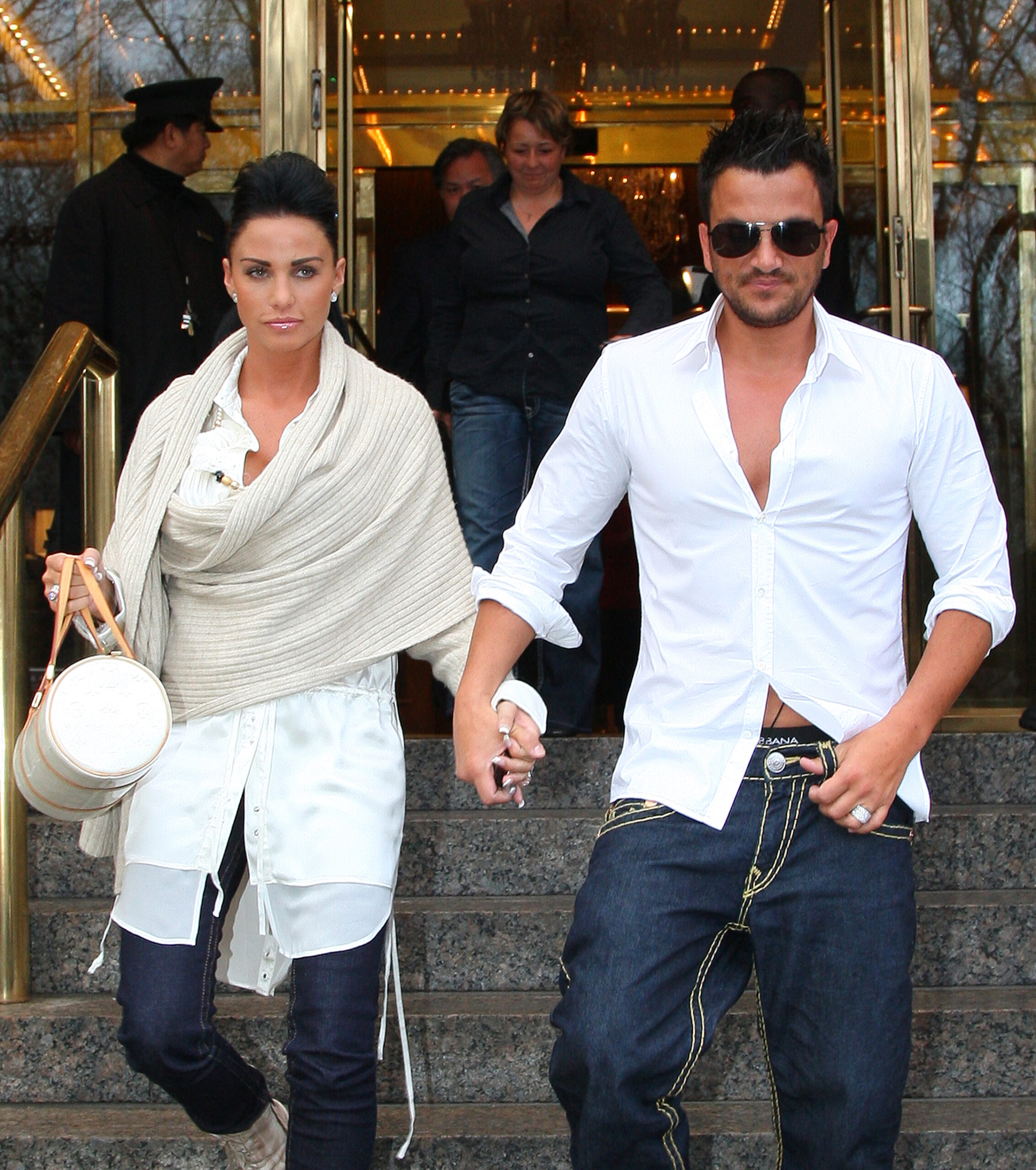 Katie Price and Peter Andre holding hands