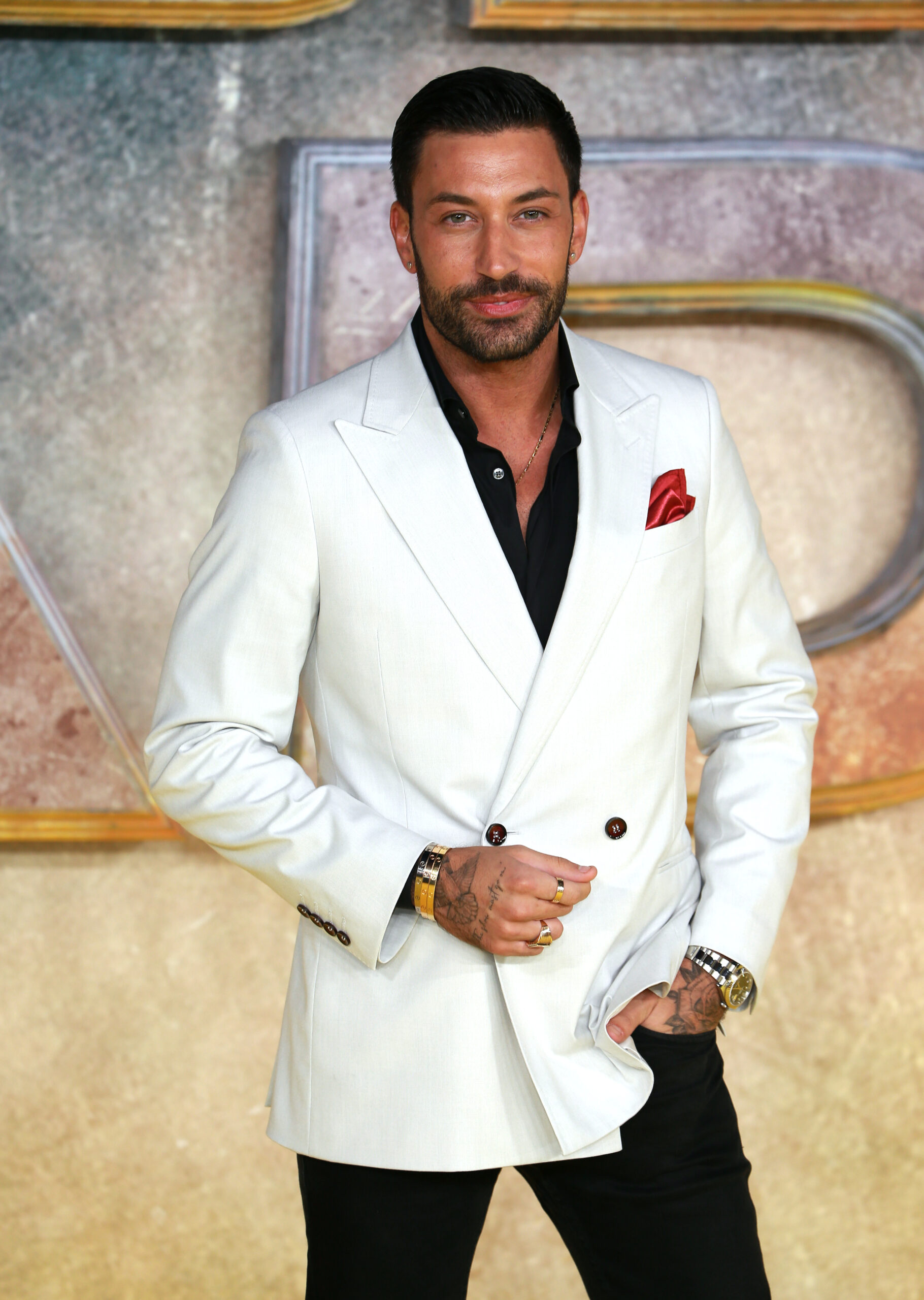 Giovanni Pernice in white blazer at event