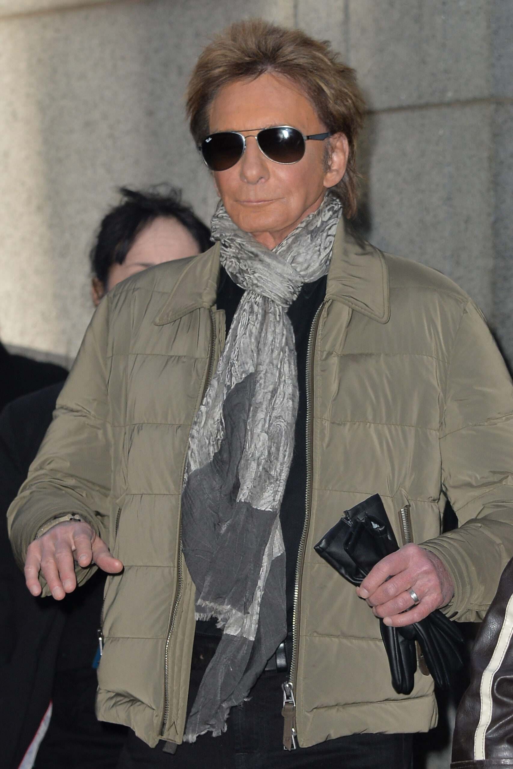 Barry Manilow walking