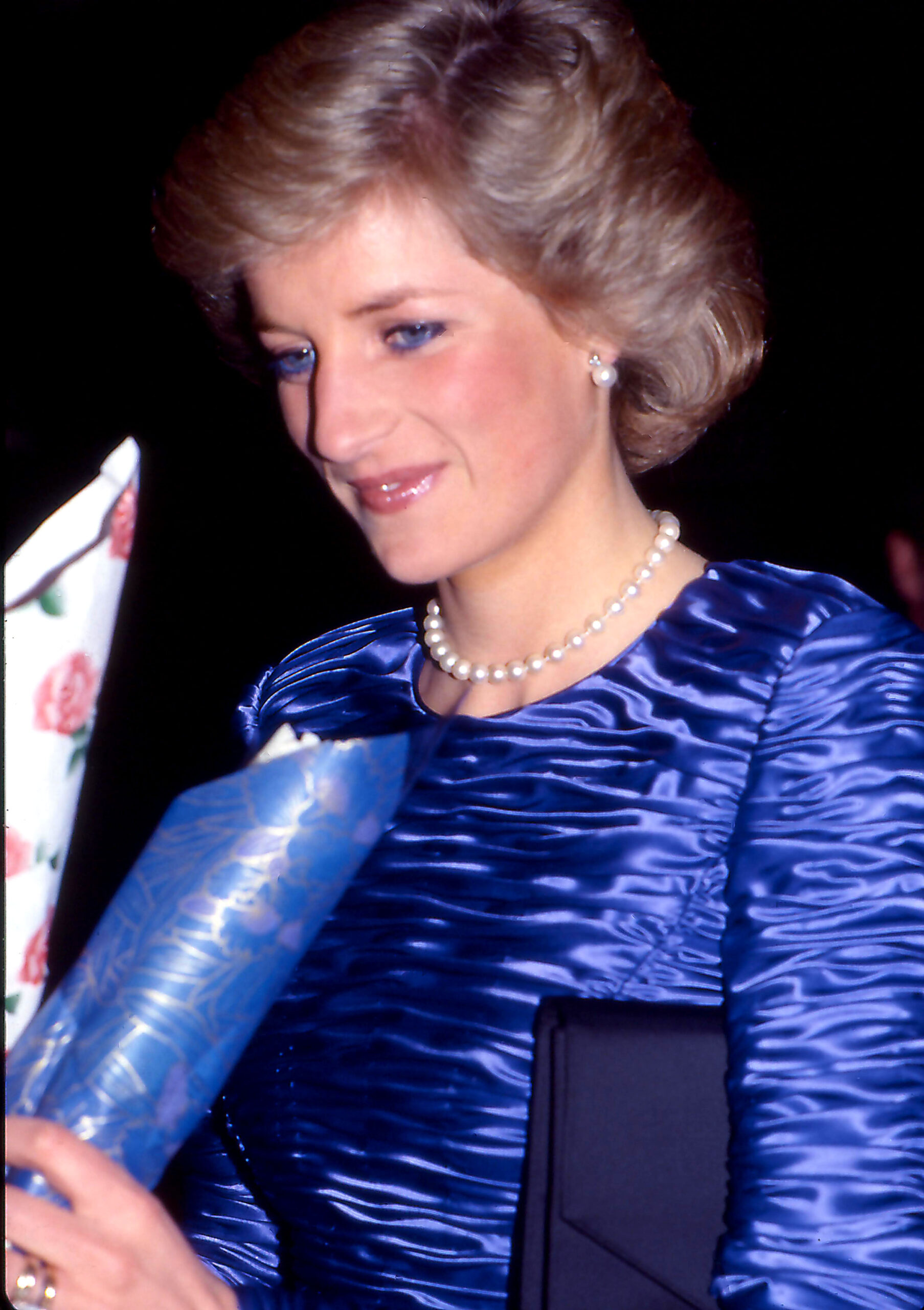 Princess Diana in a blue outfit 