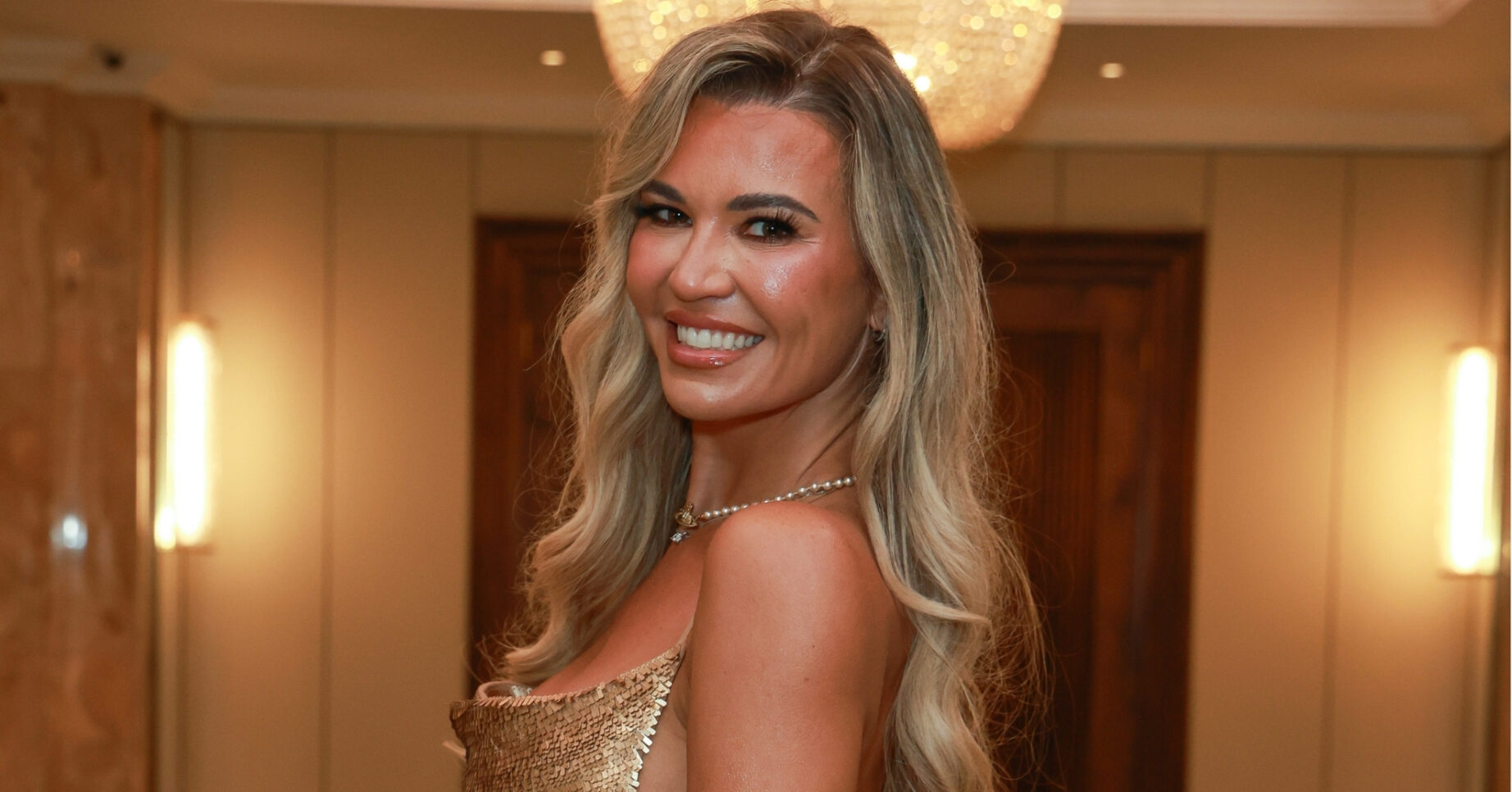 Christine McGuinness sparkles in gold mini dress