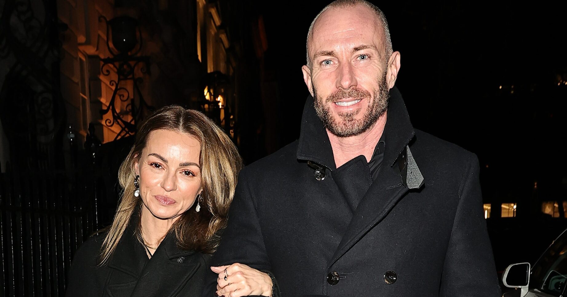 James Jordan and Ola Jordan loop arms.