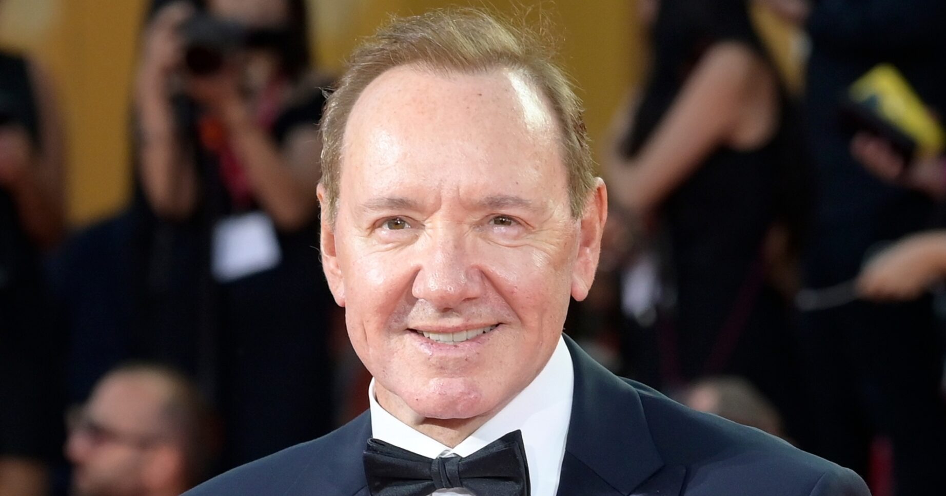 Kevin Spacey smiling at event