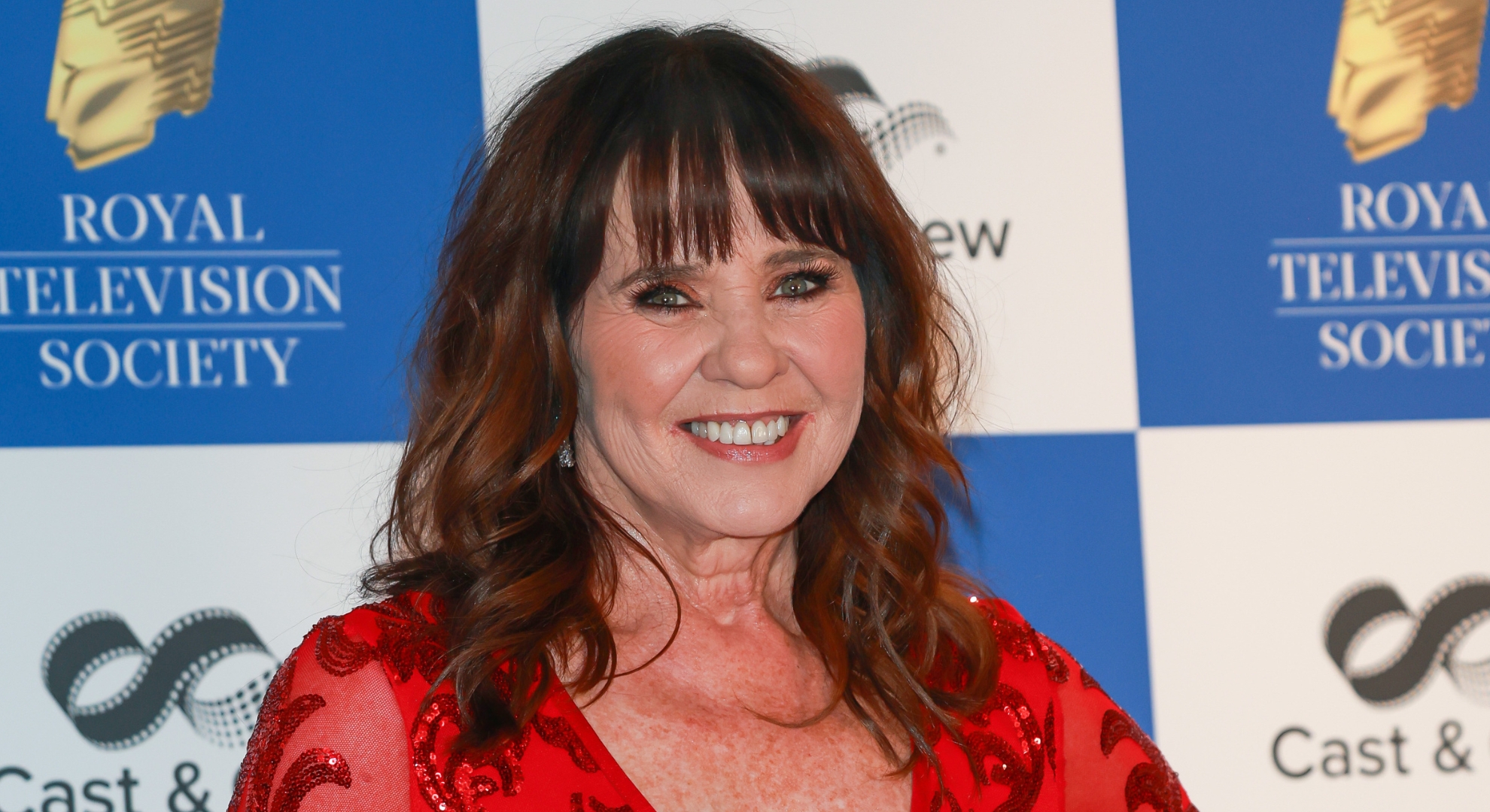 Coleen Nolan shows off 3.5st weight loss in navy dress