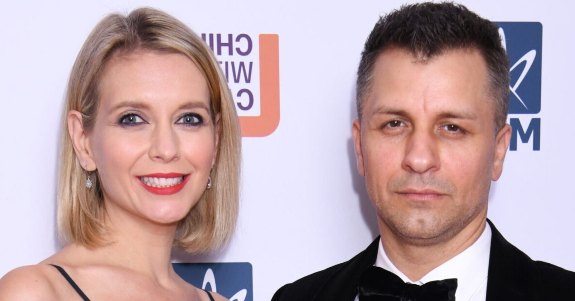 Rachel Riley and Pasha Kovalev posing together with serious expressions