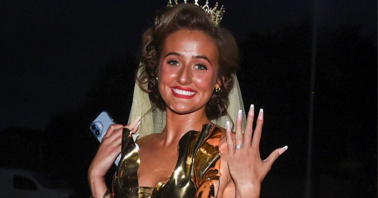 Venezuela Fury holding up her hand and showing off her engagement ring whilst smiling