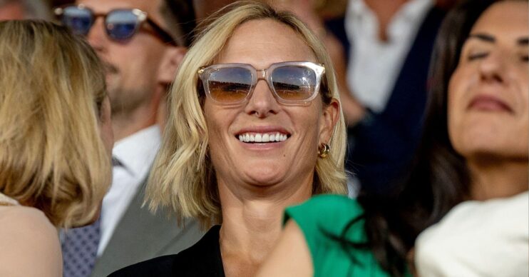 Zara Tindall smiling wearing sunglasses