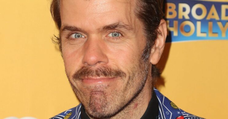 Perez Hilton smiling