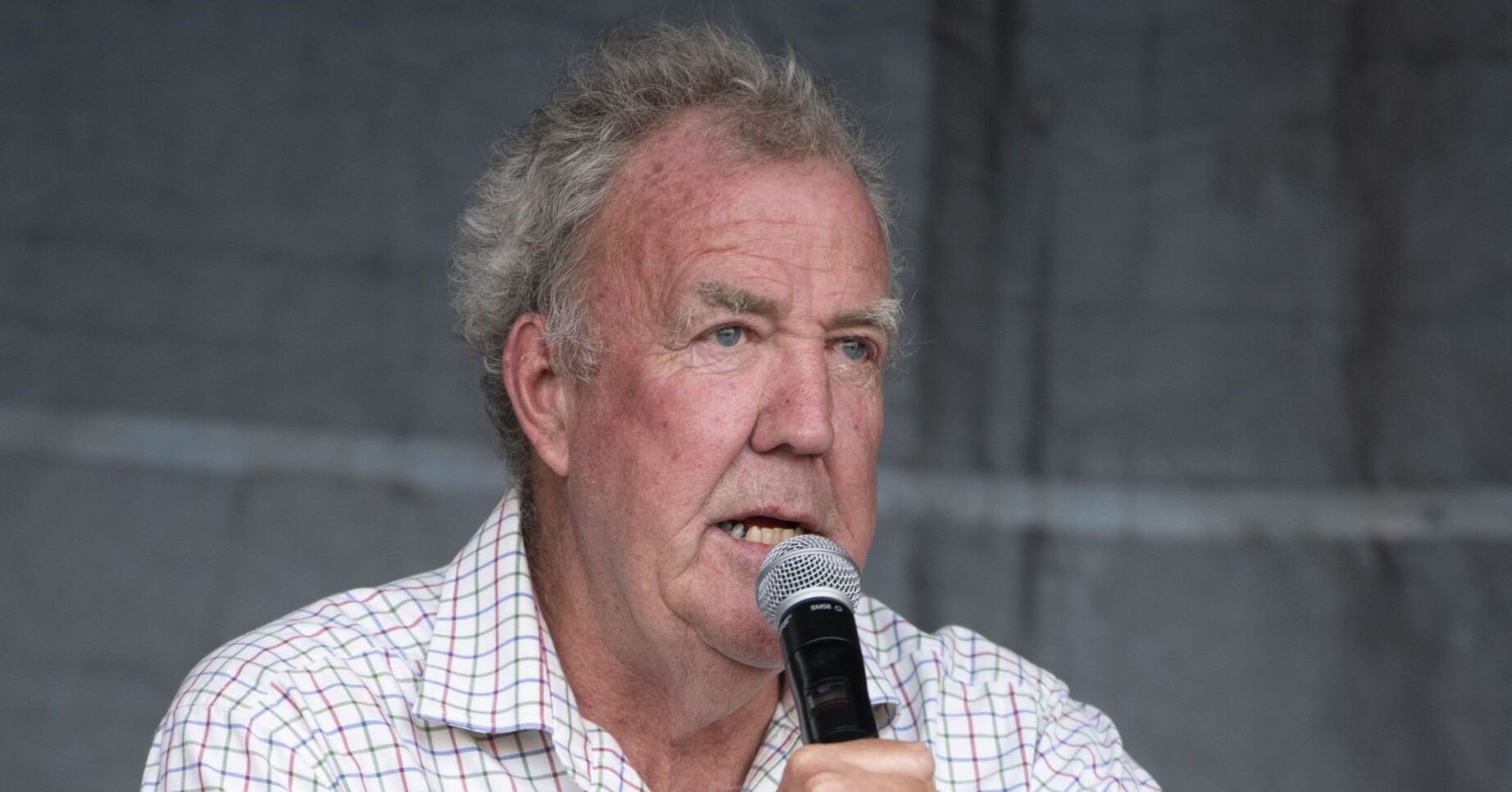 Jeremy Clarkson speaking into a mic