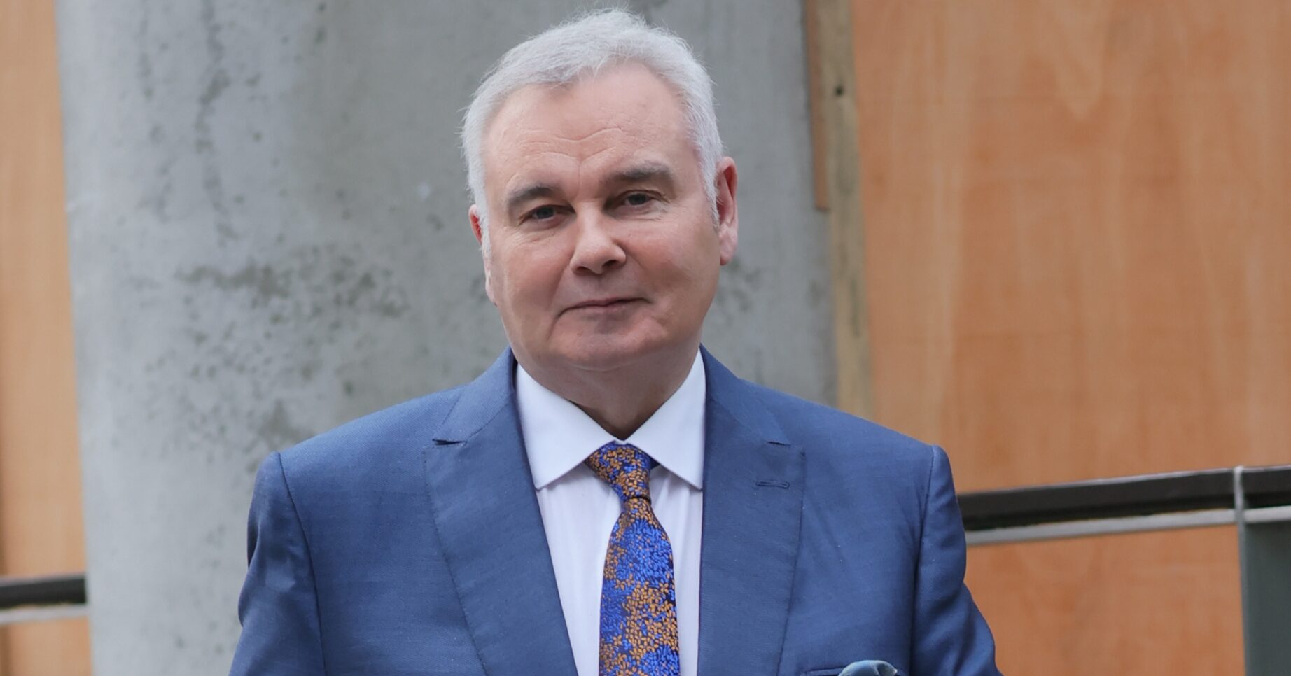 Eamonn Holmes in blue suit