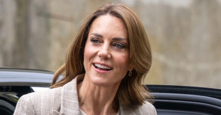Princess Kate Middleton smiling during royal engagement